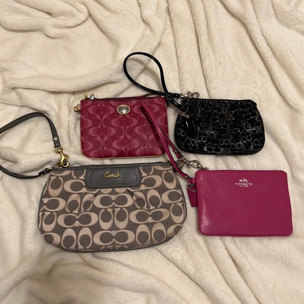 Group of Coach wristlets